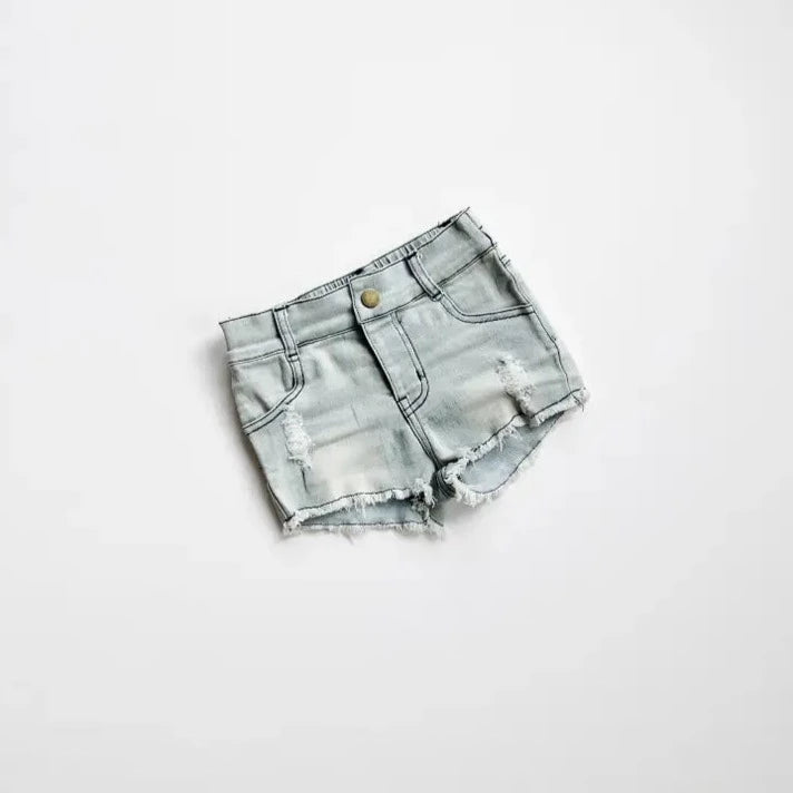 Girls Denim Shorts in Slate Grey by Orcas Lucille, laid on a flat white surface. 