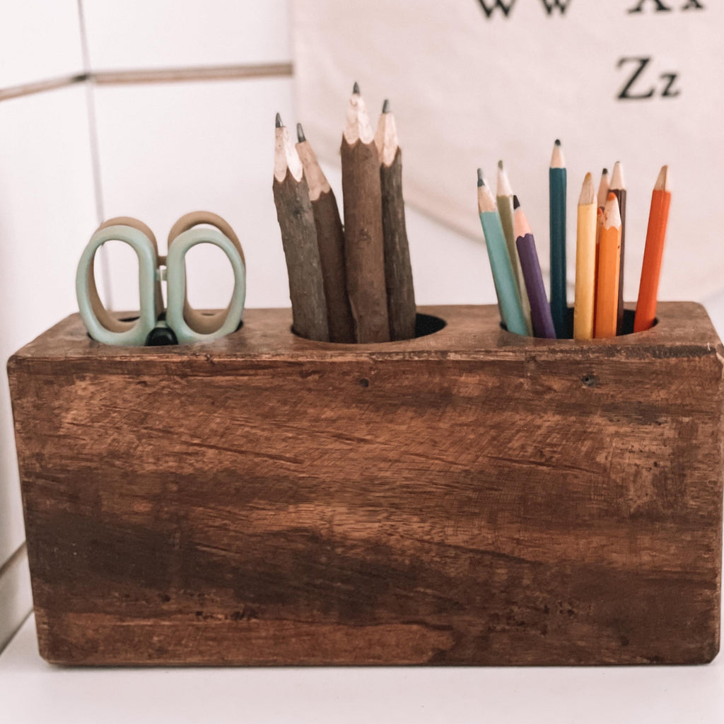 White shiplap wall with the Wooden Crayon Holder in Small | 3 holes by Forever Green Art.