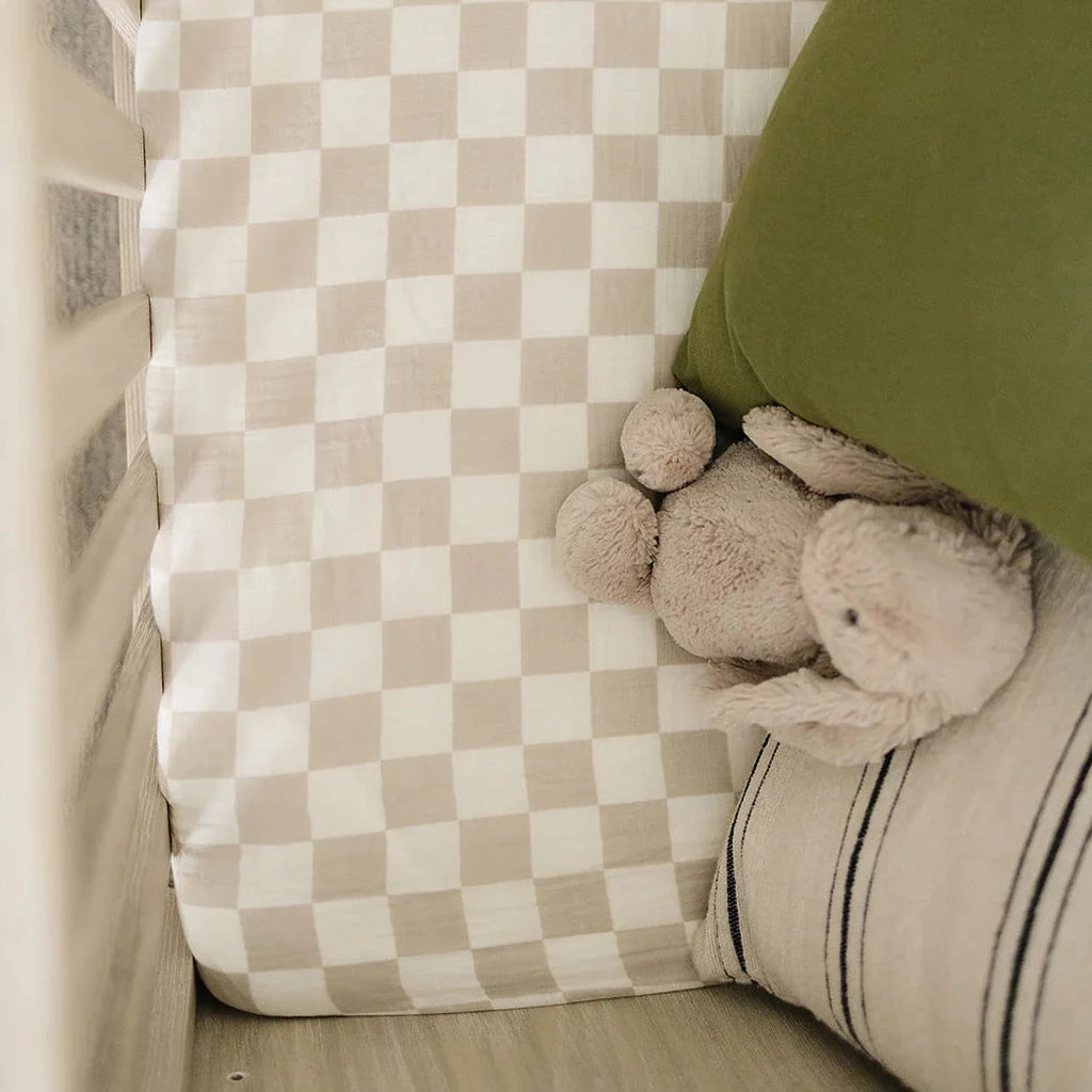 Taupe Checkered Crib Sheet by Mebie Baby olive pillow and bunny stuffie