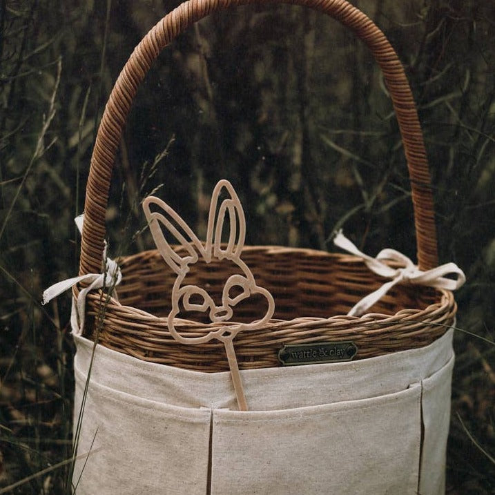 Bubble Wands by Kinfolk Pantry bunny wand next to easter basket in a field