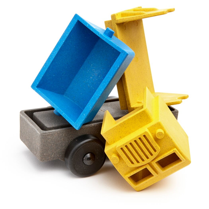 White background with disassembled 3D Tipper Truck byLuke's Toy Factory.