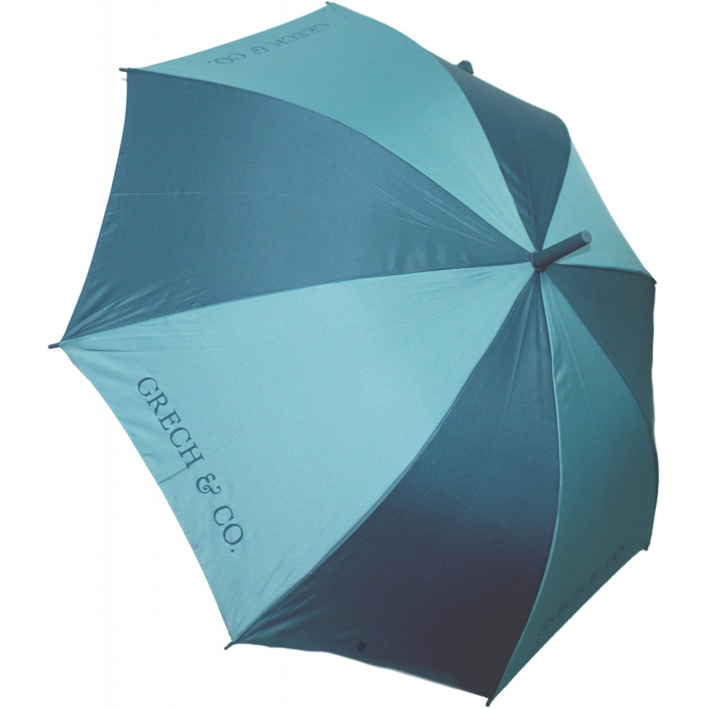White background with Adult Sustainable Umbrella by grech & Co. Alternating between Lighter and deeper blue on each panel.