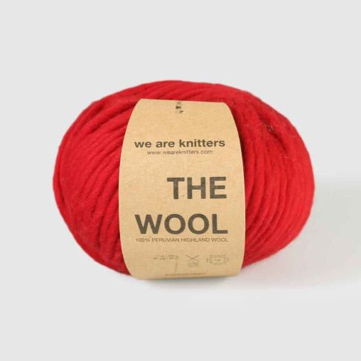 Bright Red Wool by We Are Knitters with a white background. 