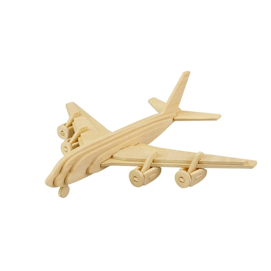 White background with a built 3D Wooden Puzzle of an Airplane by Hands Craft.