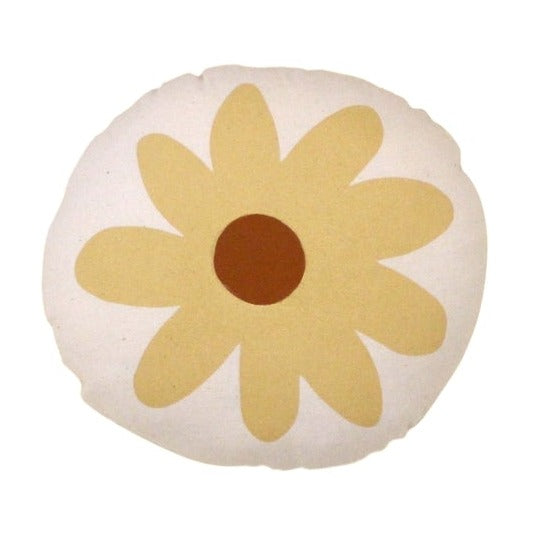 White background with Daisy Pillow by Imani Collective. Pillow is round, cream linen with a yellow daisy and a brown center.