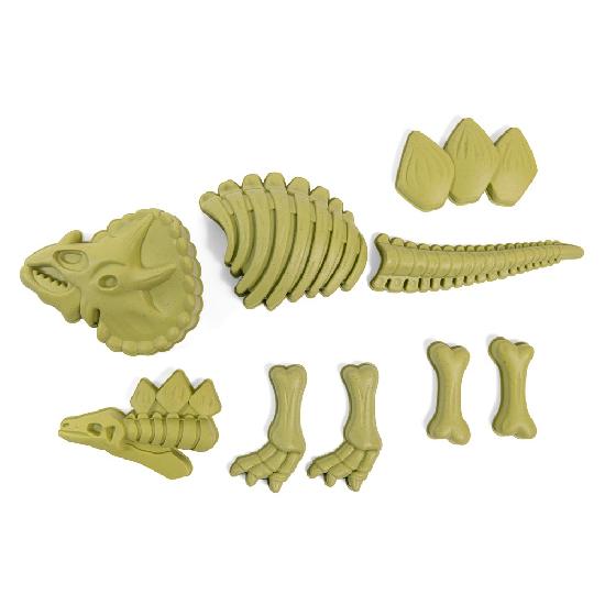 White background with Dinosaur Beach Set by Moulin Roty. Beach set is shaped like dinosaur parts, and is an olive green colour.