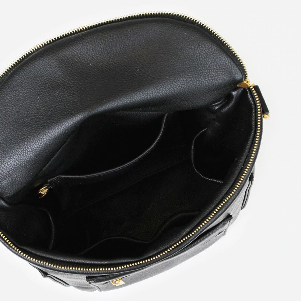 White background with overhead view of Mini Bag in Black by Fawn Design. Showing the inner pockets.