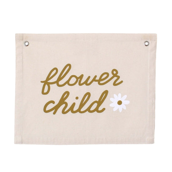 White background with Flower Child Banner by Imani Collective. Banner is linen with the words "flower child" and a white daisy.