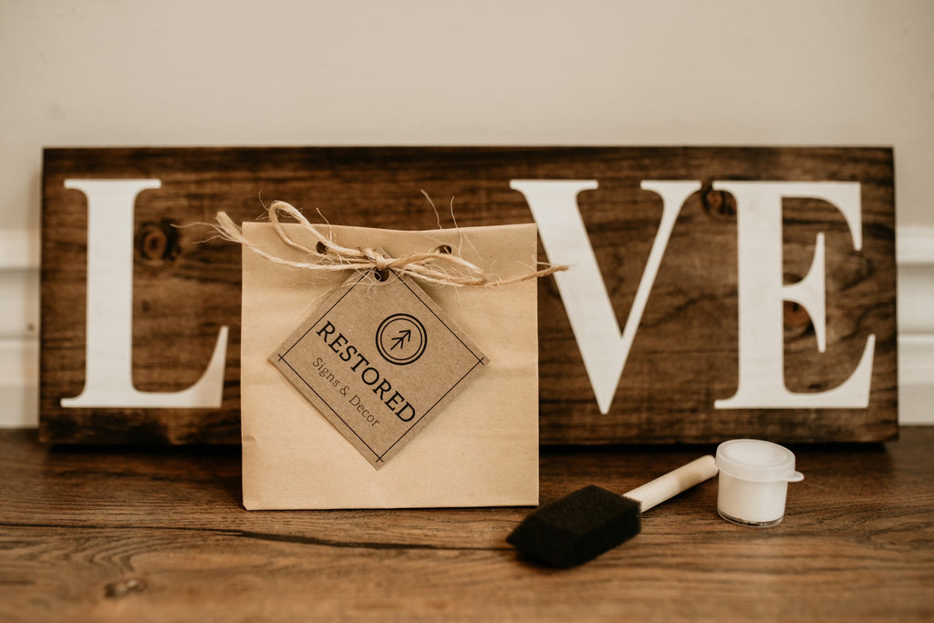 White background with the Love Kit by Restored Signs & Decor. Showing you everything that comes in the kit.