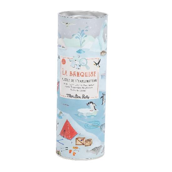 White background with La Banquise Explorateur Puzzle by Moulin Roty, in the packaging. This comes in a cylindrical package, with an arctic scene all around. 