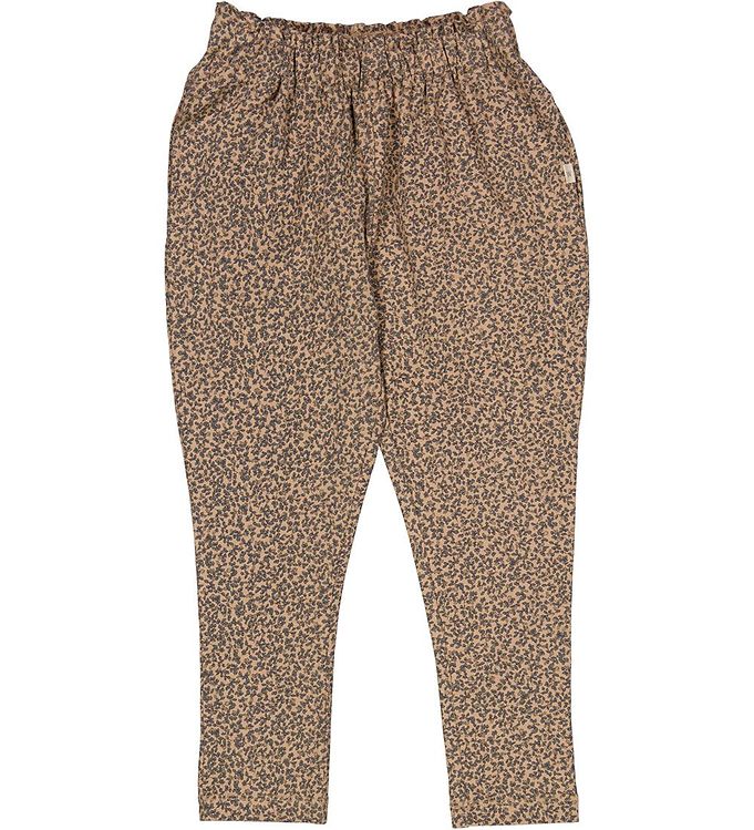White background with Malika Soft pants in Tangled Acorn by Wheat Kids Clothing. Pants have a cinched in elasticized waist, in a brownish colour with acorn pattern all over.