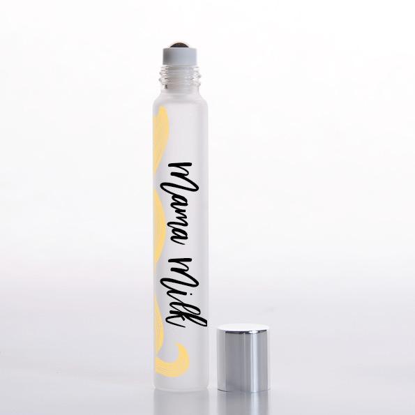 White background with rollerball of Mama Milk Essential Oil Blend by Jane + Thunder.