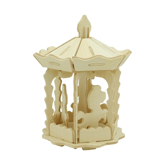White background with a built 3D Wooden Puzzle of a Merry Go Round by Hands Craft.