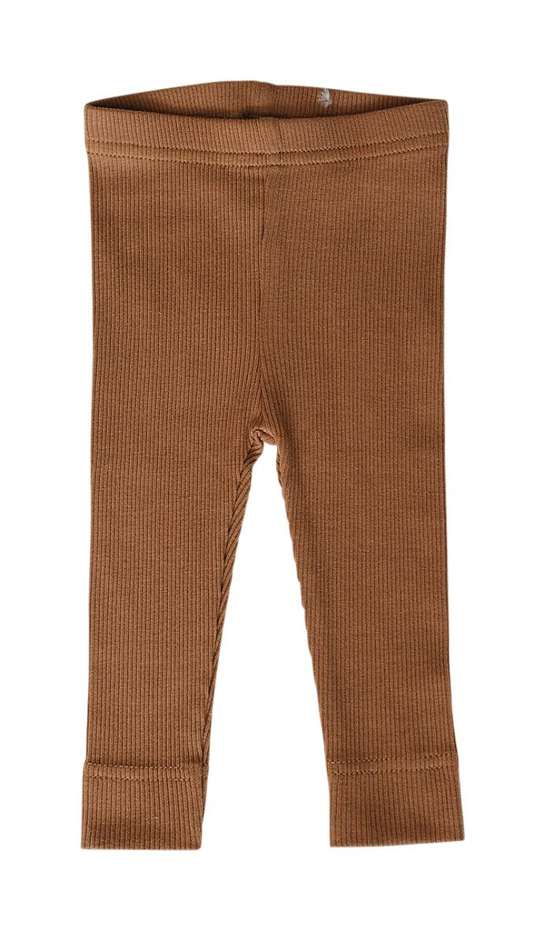 White background with Organic Leggings in Mustard by Mebie Baby. Leggings are ribbed, and are mustard colour.