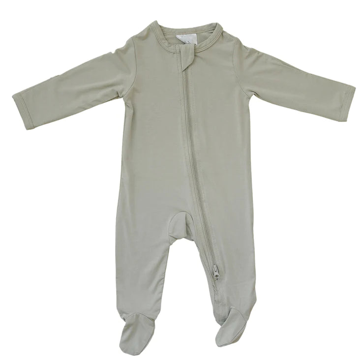 White background with the Oatmeal Bamboo Zipper One-Piece by Mebie Baby. Made of bamboo in an oat colour, with a double zipper that goes all the way down, and footies.