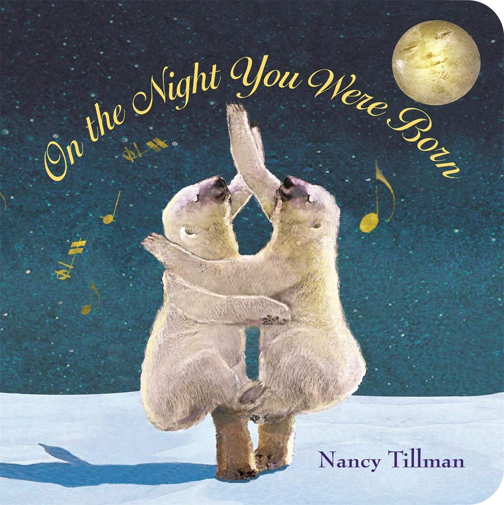 Cover of On The Night You Were Born book by Nancy Tillman. Winter night sky with 2 polar bears dancing.