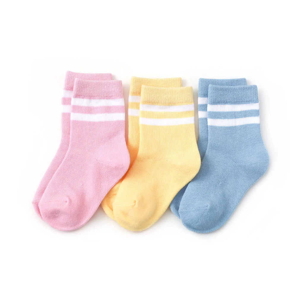 White background with Pastel Striped Midi 3-Pair Pack by Little Stocking Co. Colours are pink, yellow, and blue.