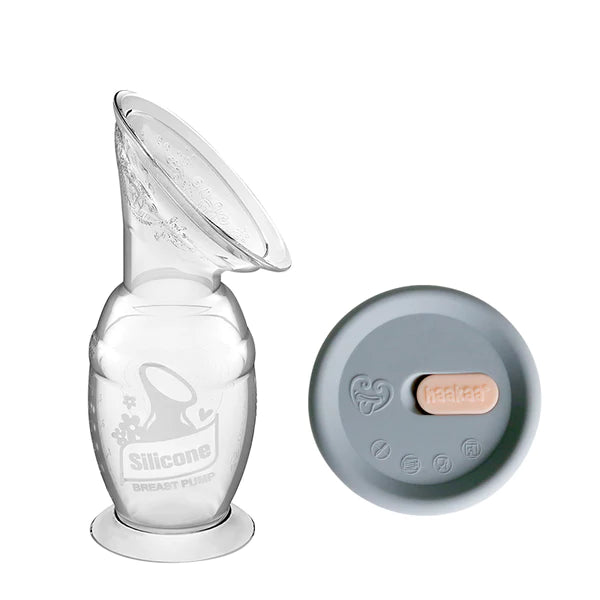 White background with Silicone Pump & Cap Set. Showing the breast pump, and the cap to cover it.