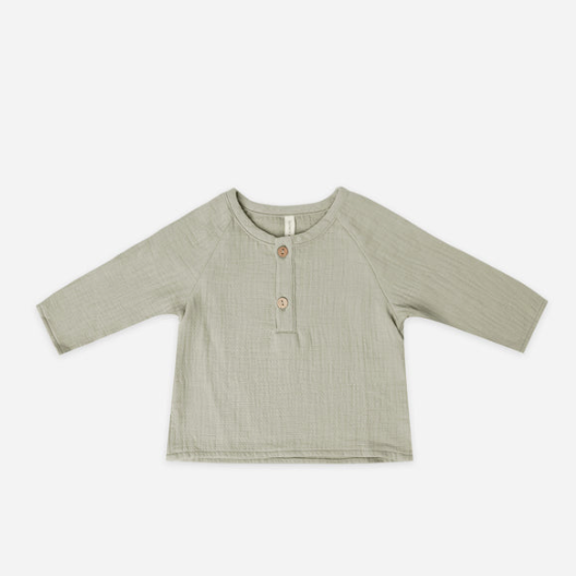 zion shirt | pistachio by Quincy Mae flat lay on white background