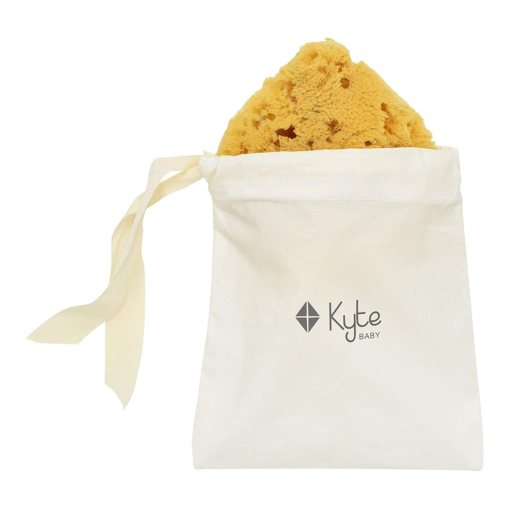 White background with Sea Sponge by Kyte Baby. Sea Sponge comes in a canvas bag that says "Kyte Baby" on the front.