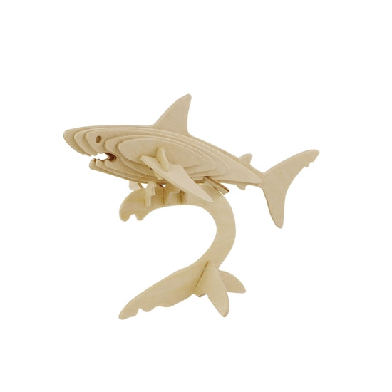 White background with a built 3D Wooden Puzzle of a shark by Hands Craft.