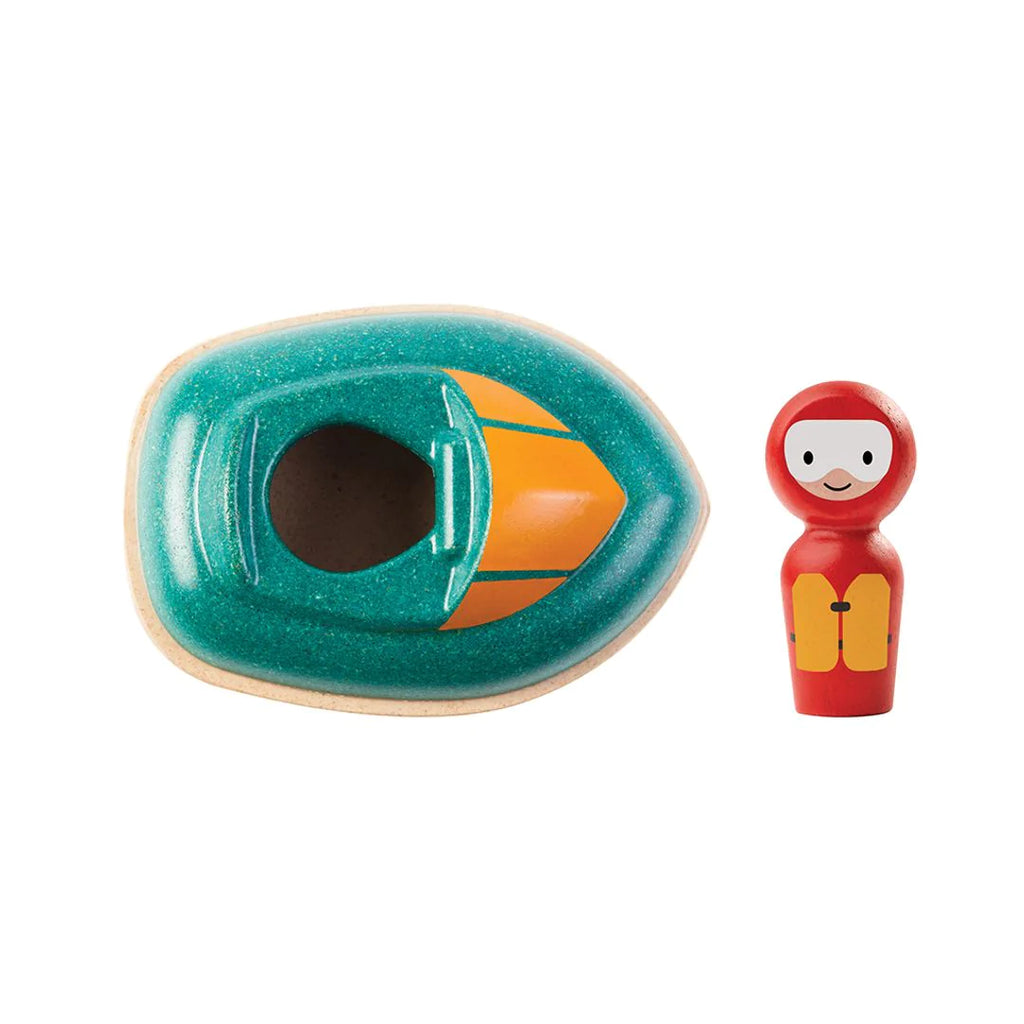 White background with the Speed Boat by PlanToys. Showing the green/yellow boat with a person in red.