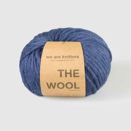 Spotted Blue Wool by We Are Knitters with a white background. 