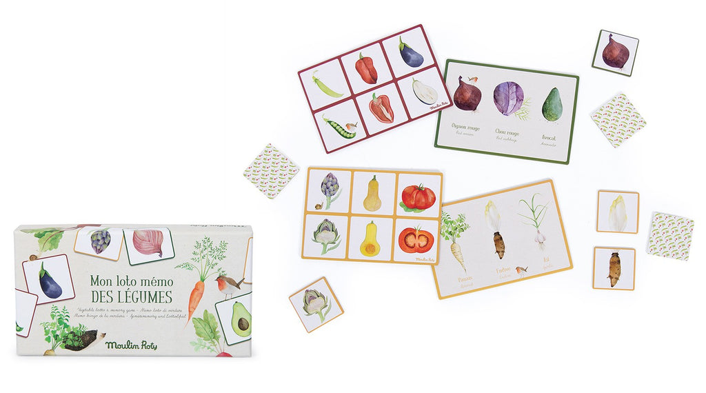 White background with Vegetable Lotto & Memory Game by Moulin Roty. This shows the items you get with the game.