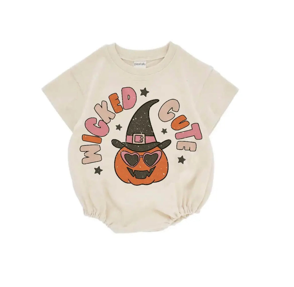 White background with the Wicked Cute Halloween Romper by Boho + Babe. Romper is a cream/white colour with a drawing of a pumpkin wearing a witches hat, and sunglasses, and it says "Wicked Cute".