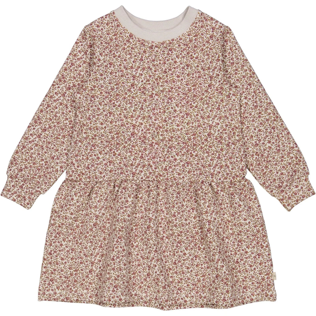 White background with Zenia Dress in Morning Dove Flowers by Wheat Kids Clothing. Dress is a grey colour with a drop waist, and red/pink floral pattern all over, in a sweatshirt material.