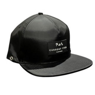 White background, Side angle of Black Made for Shae'd Waterproof Snapback by Current Tyed Clothing