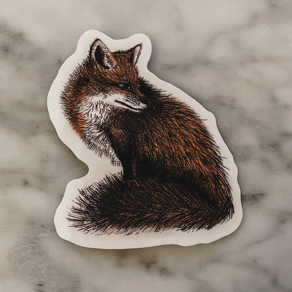White marble counter with the Sticker in Fox by The Pine Company. Sticker is a sketchy of a fox.